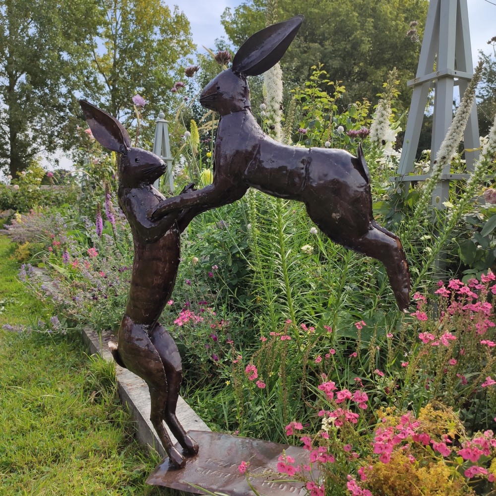 large boxing hares garden sculpture